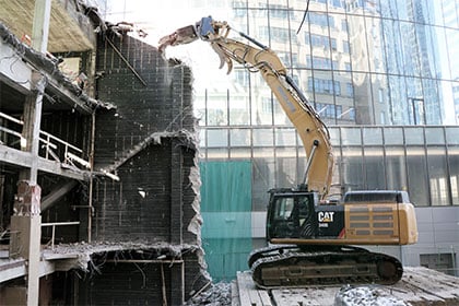 digger-at-urban-demolition-site-420x280