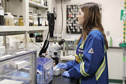 worker-in-lab-looking-at-samples